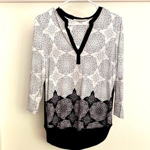 Festive black and white blouse